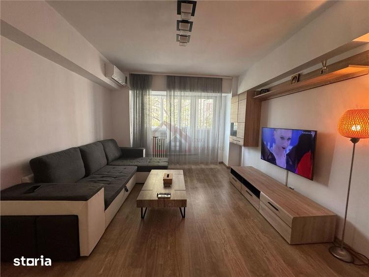 Apartament cu 2 camere semidecomandat, mobilat în Tei
