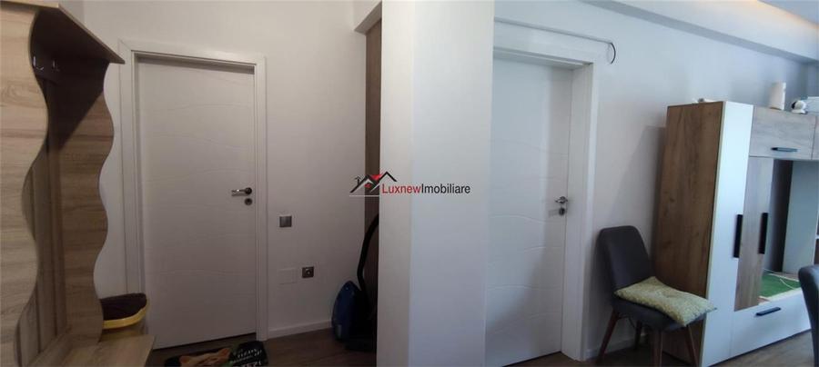 Apartament cu 2 camere, mobilat 45,6 mp utili plus balcon, garaj subteran zona T - 9
