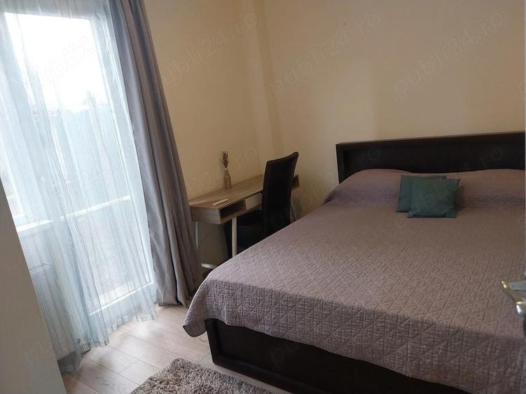 Apartament cu 2 camere semidecomandat, mobilat în Podul de Fier