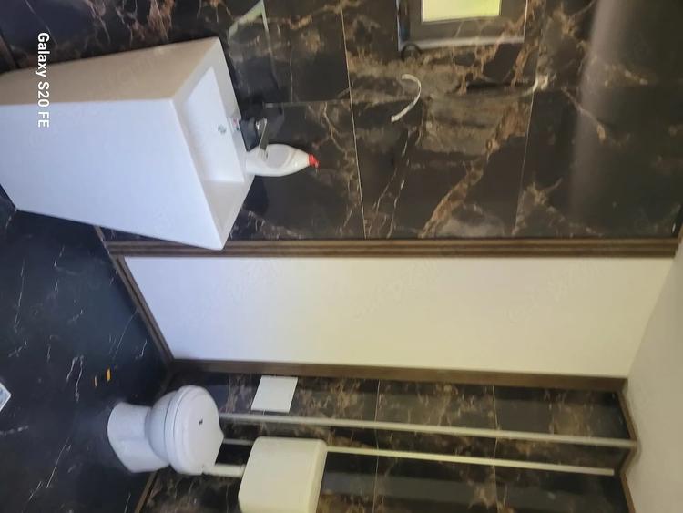 Casă cu Teren 1000 Mp în Central
