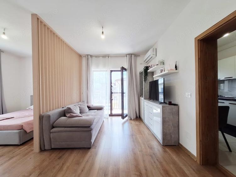 Spatios, 42 mp utili. Zona de living separata. Bucatarie inchisa. - 10
