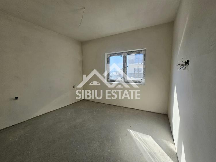 Apartament cu 3 camere decomandat în Șelimbăr — fotografia 3