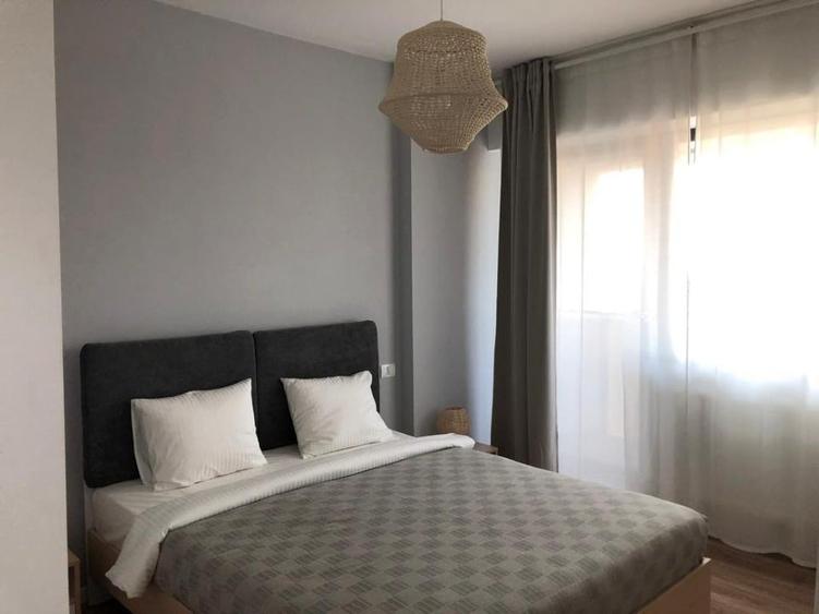 Apartament cu 2 camere semidecomandat, mobilat în Central