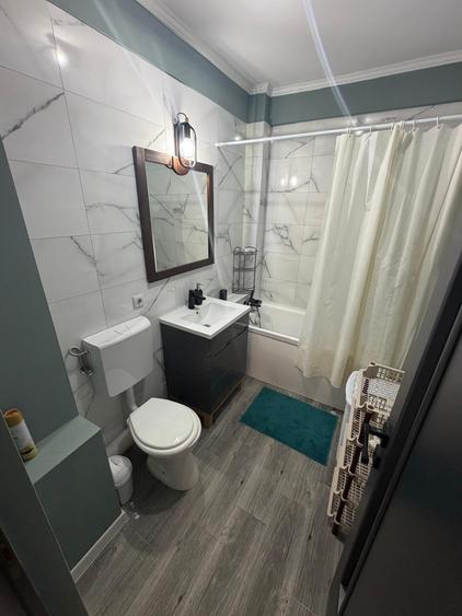 Apartament cu 2 camere semidecomandat, mobilat în Florești