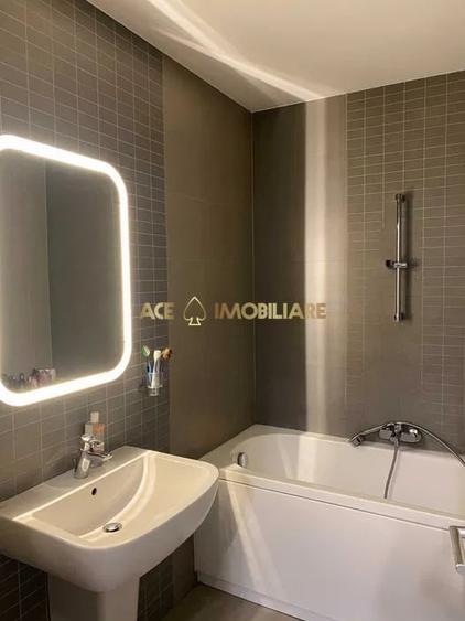 Apartament cu 2 camere semidecomandat, mobilat în Regie