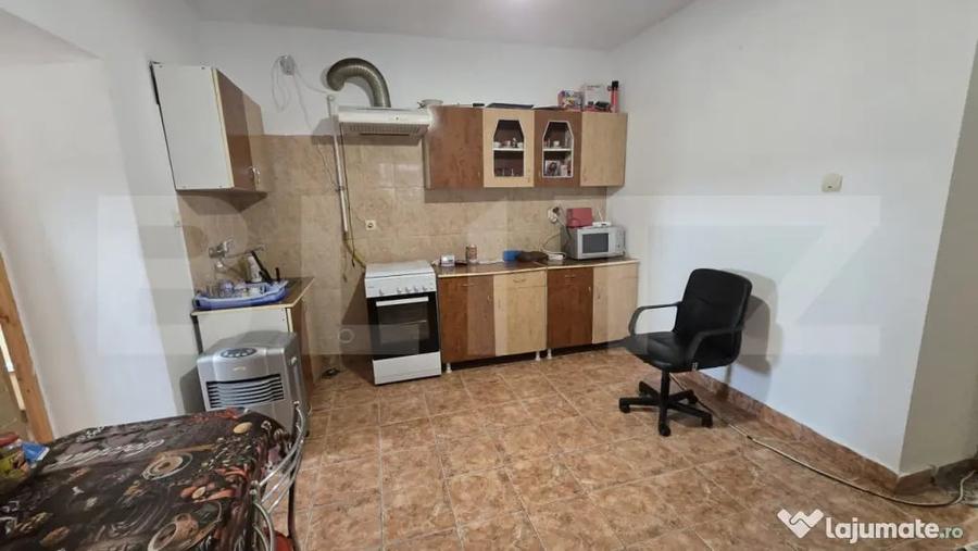 Casă cu 2 camere cu Teren 1000 Mp în Central