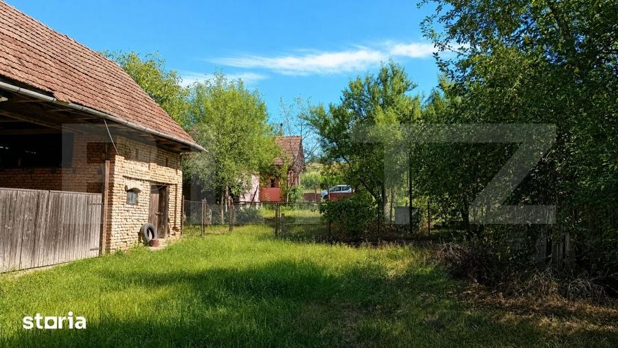 Casă cu 2 camere cu Teren 2200 Mp în Central