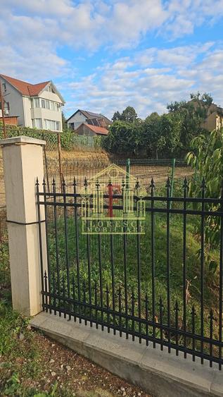 Teren Construcții intravilan de 600 mp, în Bucium