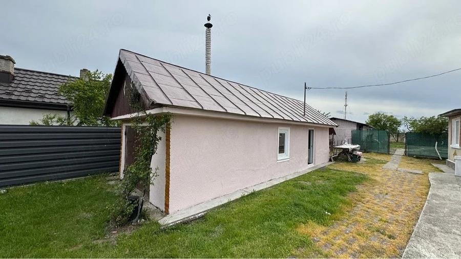 Casă cu Teren 5500 Mp în Bălteni