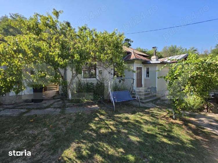 Casă cu 3 camere cu Teren 1820 Mp în Centură
