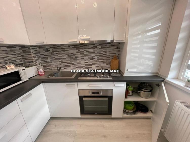 Apartament cu 2 camere, mobilat în Central