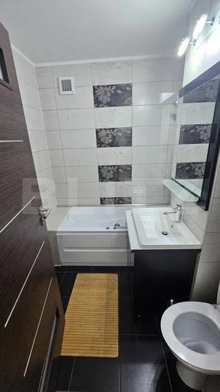 Apartament cu 2 camere semidecomandat, mobilat în Central