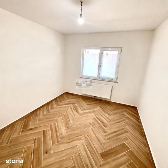 Apartament cu 4 camere decomandat în Străoane