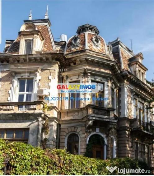 Casă cu 12 camere cu Teren 450 Mp în P-ța Romană