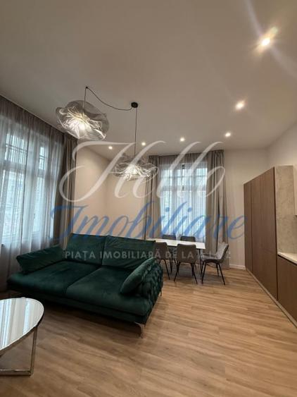 Apartament cu 2 camere semidecomandat, mobilat în Central
