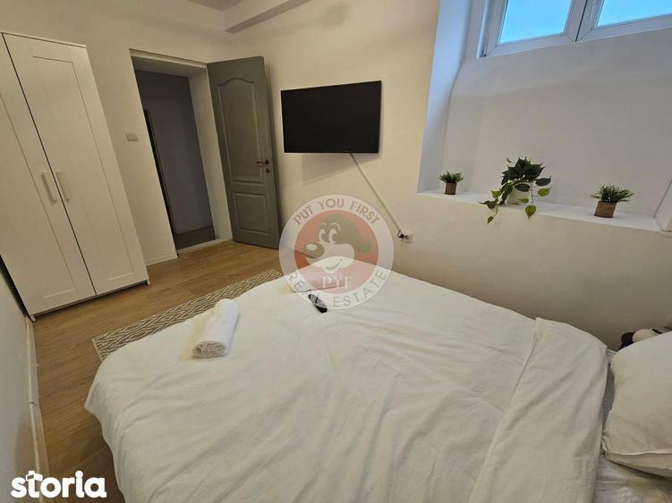 Apartament cu 4 camere decomandat în Romană