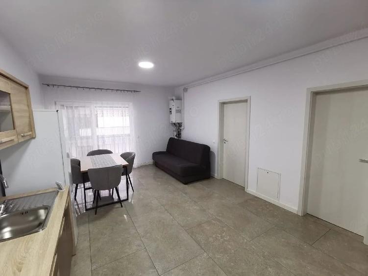 Apartament cu 2 camere decomandat în Chinteni
