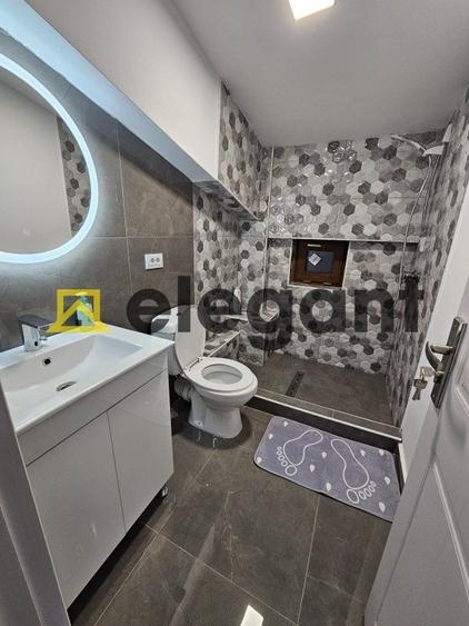 Casă individuală cu 7 camere cu Canalizare în Titulescu