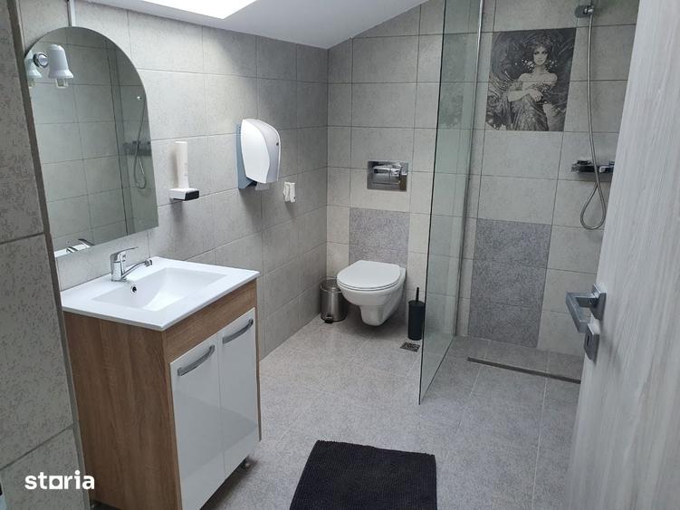 Casă cu 7 camere cu Teren 1500 Mp în Sânmartin