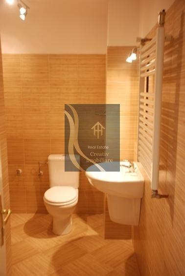 Apartament cu 3 camere semidecomandat în Dorobanți