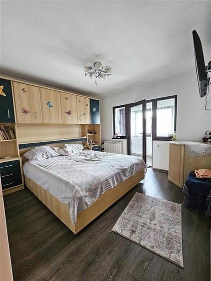 IN EXVLUSIVITATE APARTAMENT 2 CAMERE PARTER DE VANZARE IN ONESTI - 3