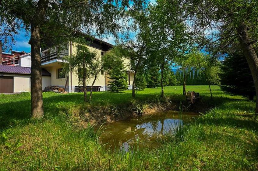 FILM!Refugiu elegant,cadru natural rar, vecinatati discrete,1.700 mp domeniu ver - 30