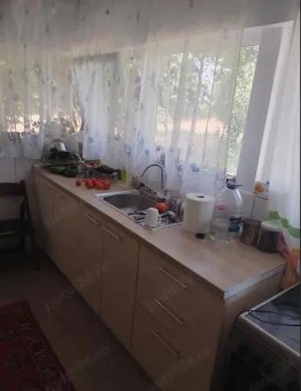 Teren cu doua corpuri casa - 35500 eur - 9