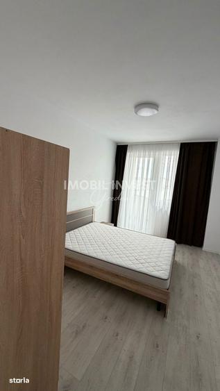 Apartament modern,2 camere, etaj 2,complet mobilat -utilat,cartier nou - 2