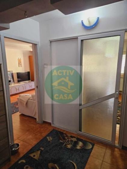 Apartament cu 3 camere decomandat în Roman - 7