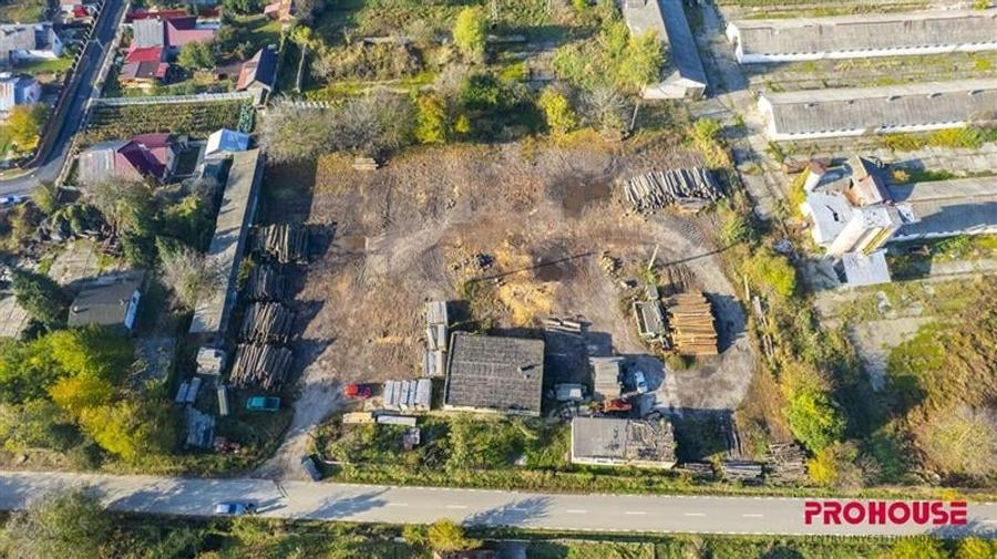 Racaciuni - teren intravilan 6.886mp - hale in suprafata de 265mp - 4