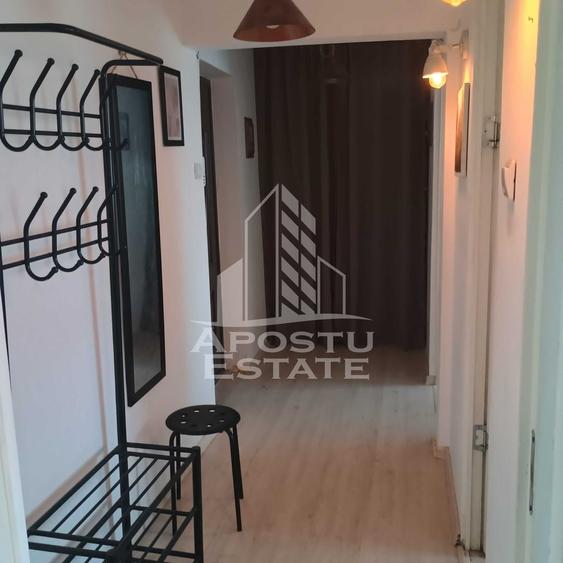 Apartament cu 3 camere semidecomandat, mobilat în Torontalului
