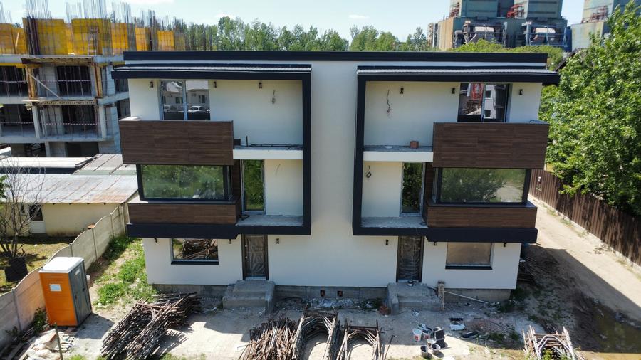 Casa moderna sector 4 P+1+M. 4 cam.Util 133mp. Terem 180mp - 6