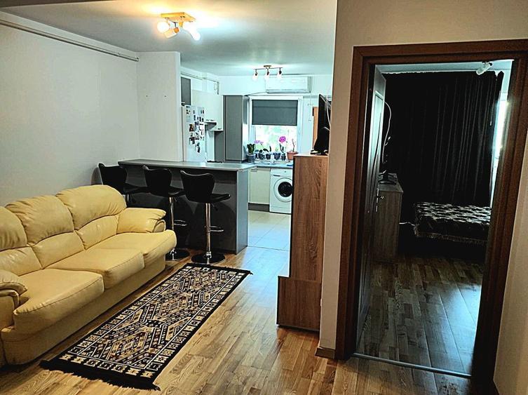 Apartament 2 camere cu parcare interioara Et.1 open space Bacau Tazlau - 1