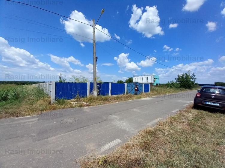 Teren intravilan 1187 mp , strada asfaltata , utilitati - 1