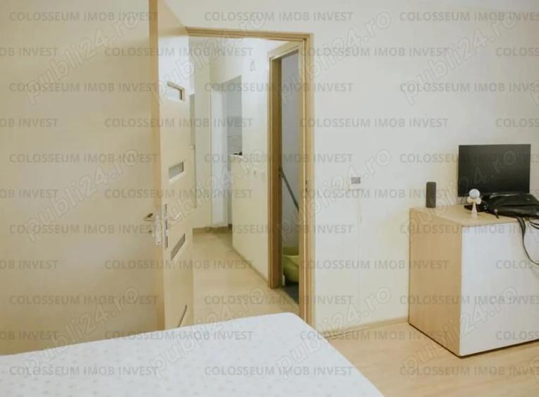 Zona Calea Bucuresti -Garsoniera mobilata bloc de apartamente - 7