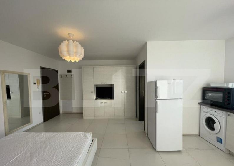 Garsoniera tip studio, 30 mp,imobil nou, zona strazii G.V.Bi - 9