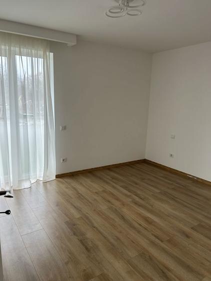 Inchiriez apartament 56 metri patrati util plus gradina 30 de metri in cadrul complexului Ama Residence - 1