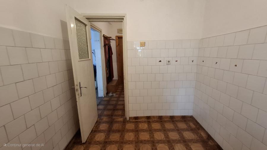 Strada Traian - ap 2 cam , parter /10 , gaze la usa (cf 1) SU 48 mp - 8