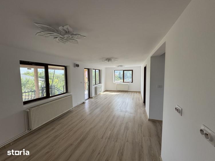 Casă cu 4 camere cu Teren 1000 Mp în Holboca
