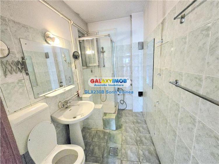 Casă cu 14 camere cu Teren 400 Mp în Baba Novac