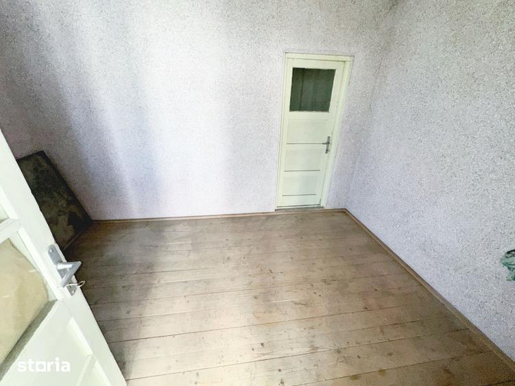 Casă cu 4 camere cu Teren 12500 Mp în Central