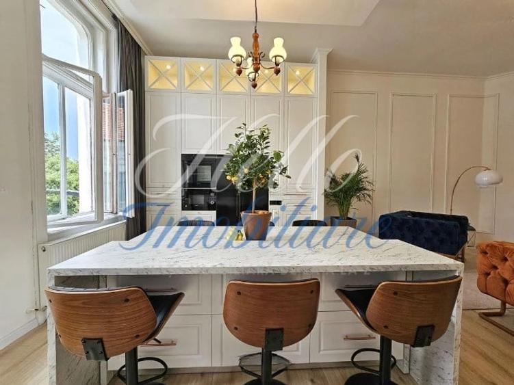 Apartament cu 3 camere semidecomandat, mobilat în Central