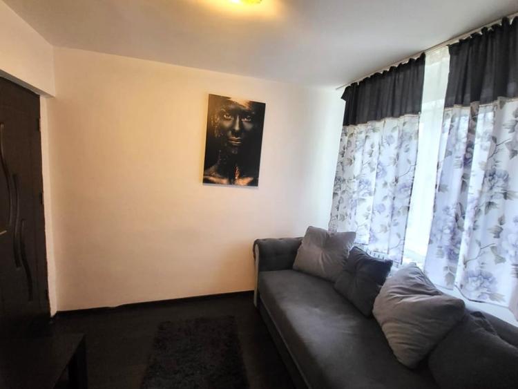 Apartament cu 2 camere semidecomandat în Podu Roș