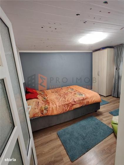 Casă cu 4 camere decomandat în Căpățânești