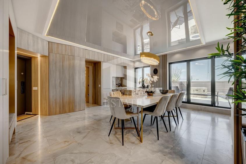 Penthouse cu 5 camere decomandat, mobilat în Mihai Bravu