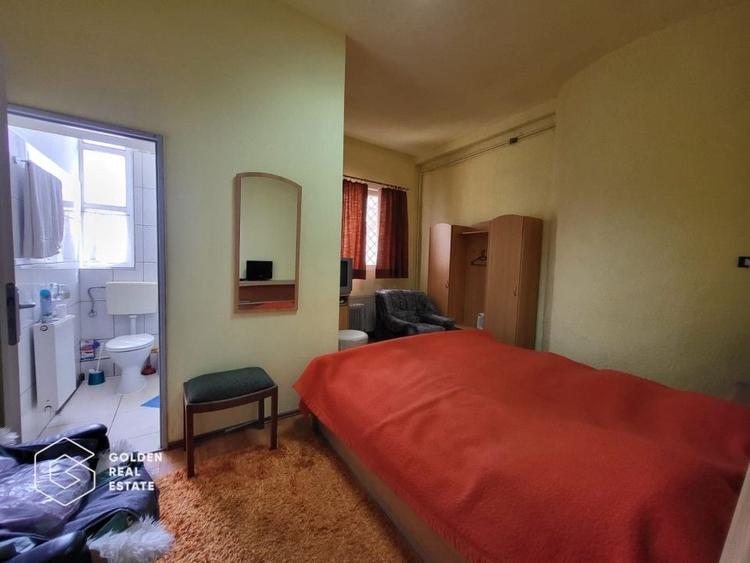 Casă individuală cu 12 camere cu Teren 1000 Mp în Central