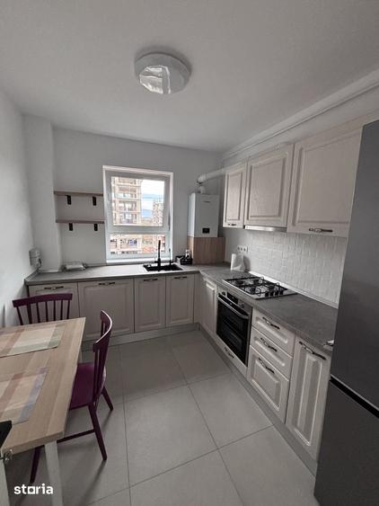 Apartament cu 2 camere decomandat în Tractorul