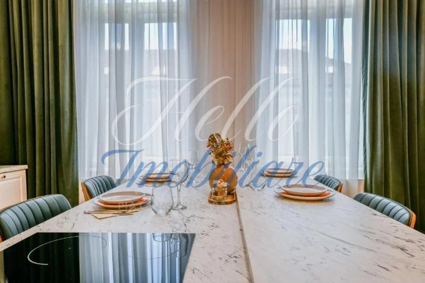 Apartament cu 3 camere semidecomandat, mobilat în Central