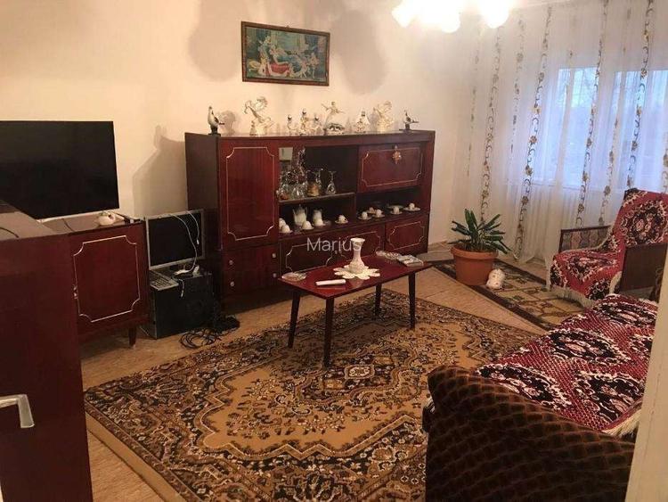 Apartament 3 camere si teren intravilan de vanzare