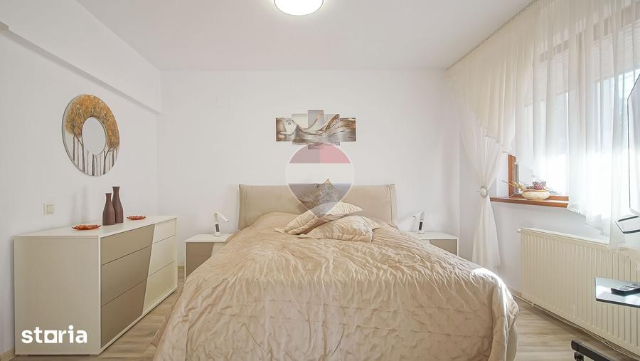 Apartament cu 4 camere decomandat în Clăbucet